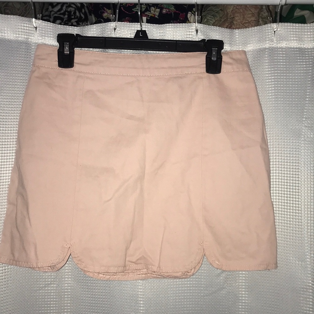 Scalloped pink mini skirt